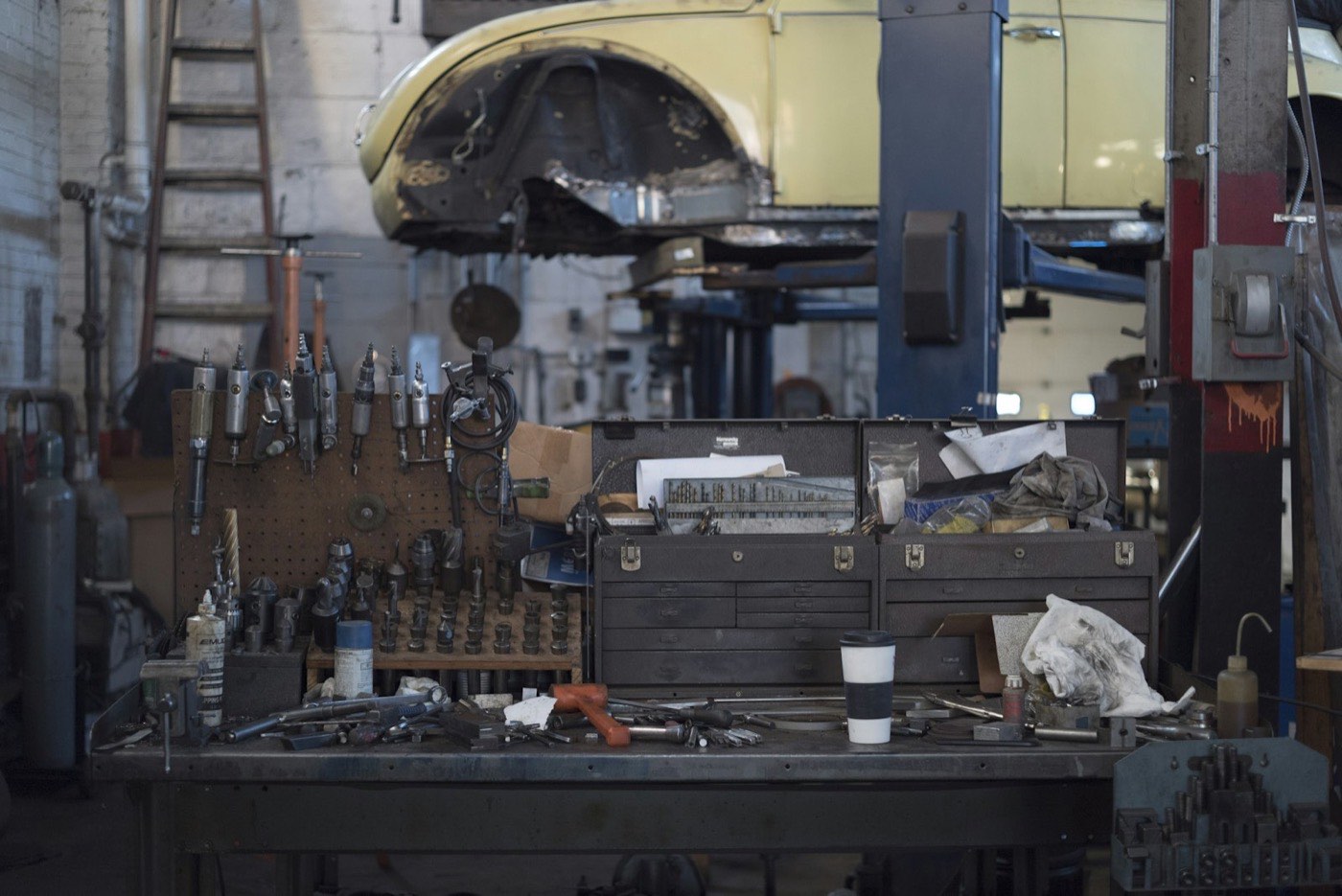 A workbench full of hand tools inside the Redstone Auto Care shop